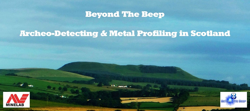 A distant view of Burnswark Hill Fort from the South with caption